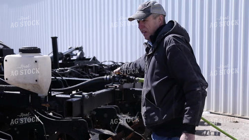 Farmer Fixes Planter