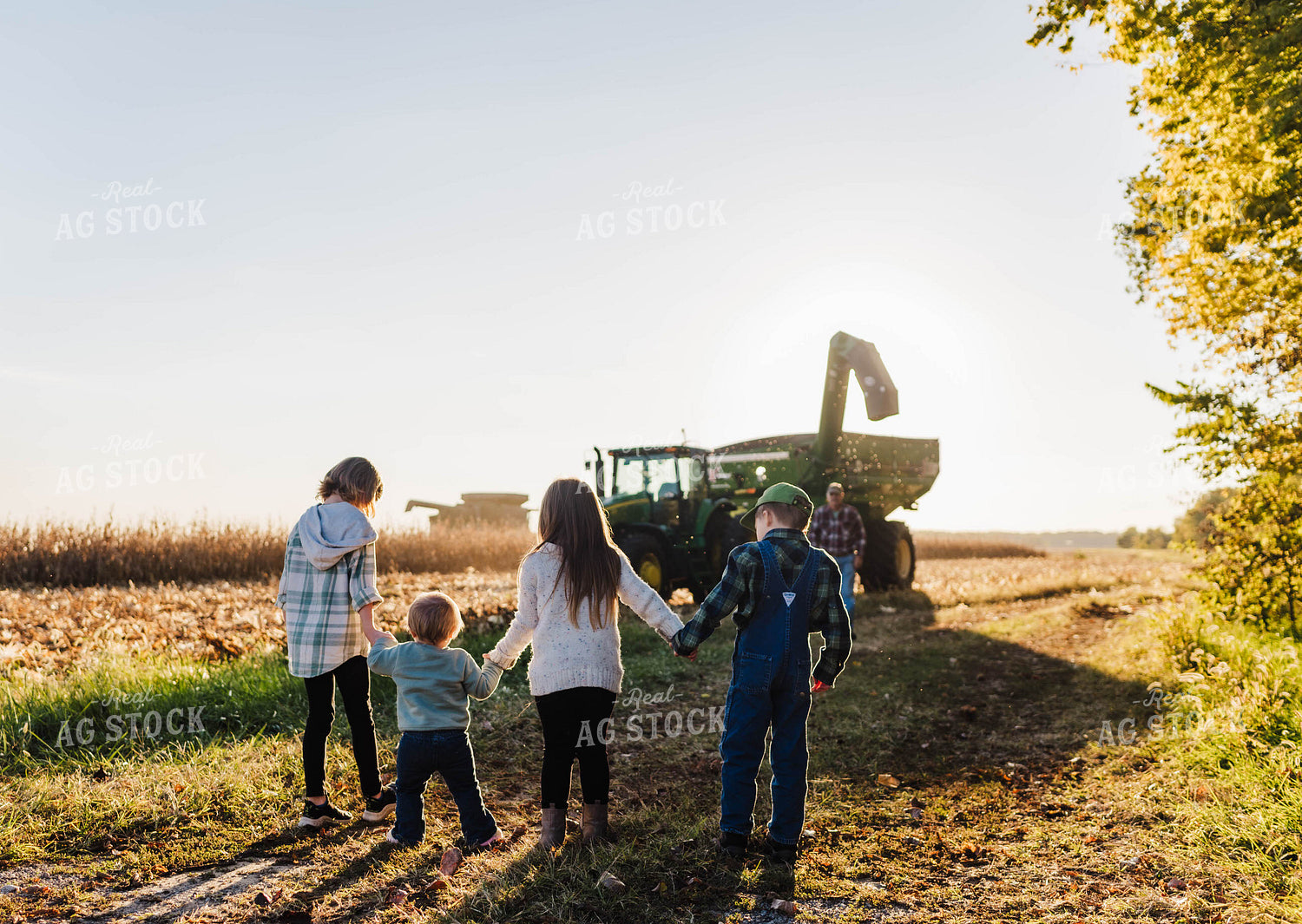Farm Kids Greeting Farmer in Field 115130