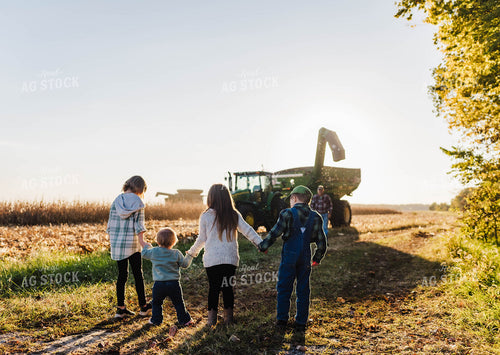Farm Kids Greeting Farmer in Field 115130