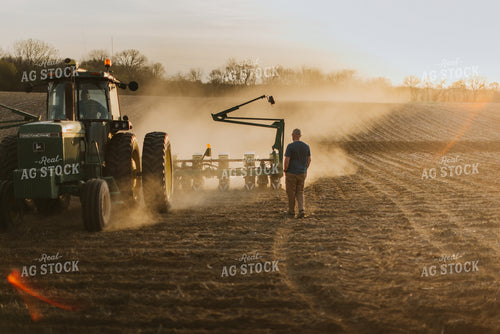 Farmer Walking Towards Planter 7443