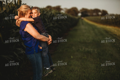 Farm Family Laughing next to Corn Field 4552