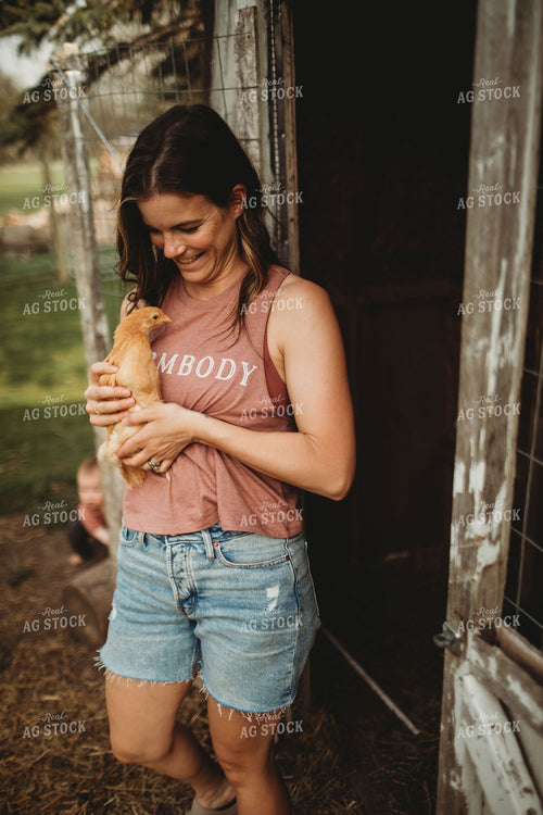 Farmer with Young Chickens 5586