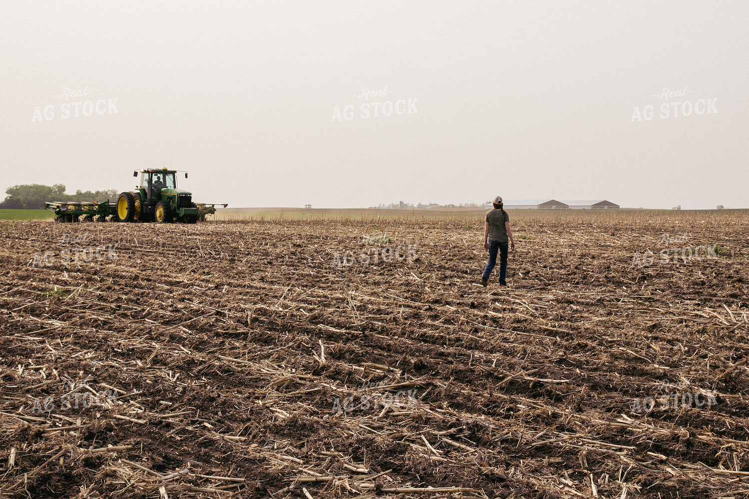 Female Farmer Approaching Tractor Planting Field 67321