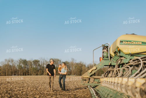 Young Couple with Child Walk Along Planter 7682