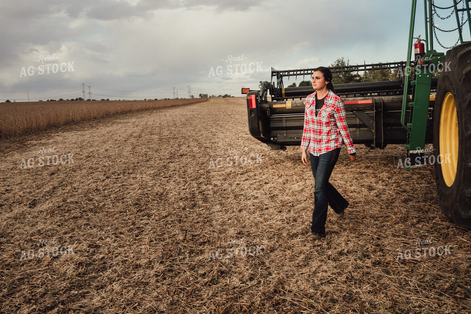 Female Farmer Getting Out of Combine 3499