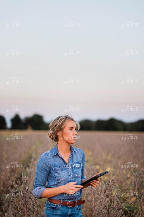 Female Farmer on Tablet in Field 8371