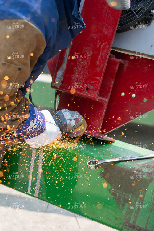 Farmer Uses Angle Grinder to Remove Hydraulic Oil Cooler Fan and PTO Pump Mounted on Planter 50365