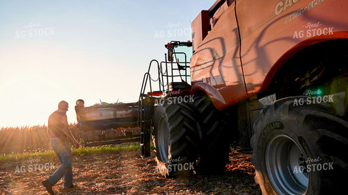 Farmer Climbing into Combine 25529
