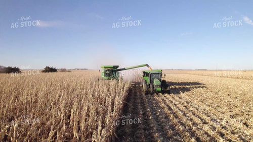 Aerial of Corn Harvest Combine Unloading 114035
