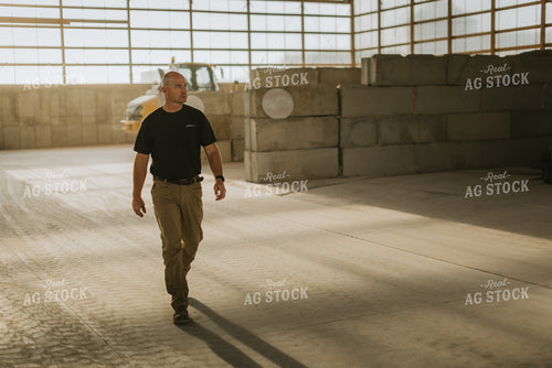 Farmer Walks in Shed 7605