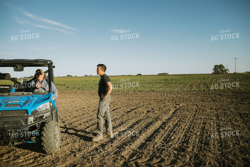 Farmers in Field with UTV 4256