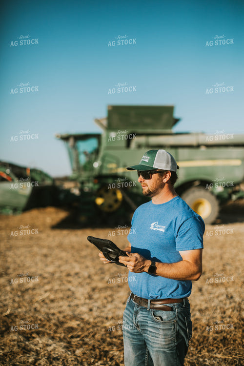 Farmer in Field With Tablet 7155