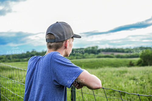 Farm Kid Leaning on Fence 191157