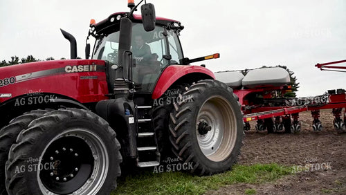 Farmer Climbing into Cab - 173