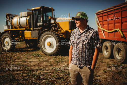 Farmer with Sprayer and Water Truck 4381