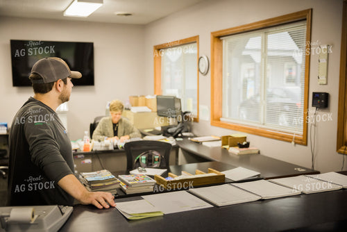 Retailer Working in Office 7956