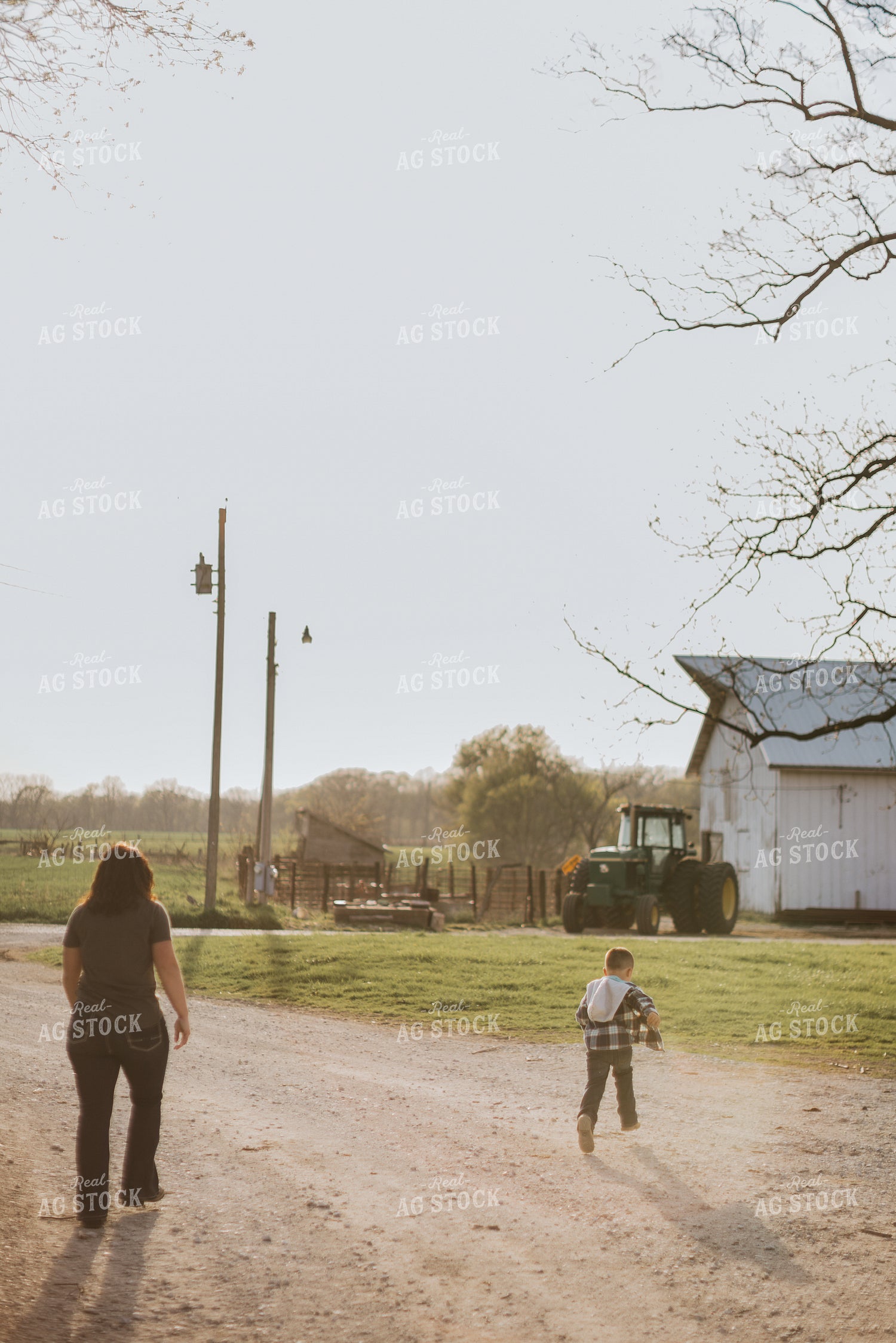 Farmer and Farm Kid in Farmyard 7385