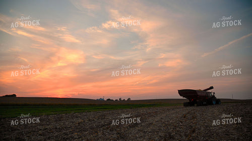 Grain Cart Driving at Sunset 25502