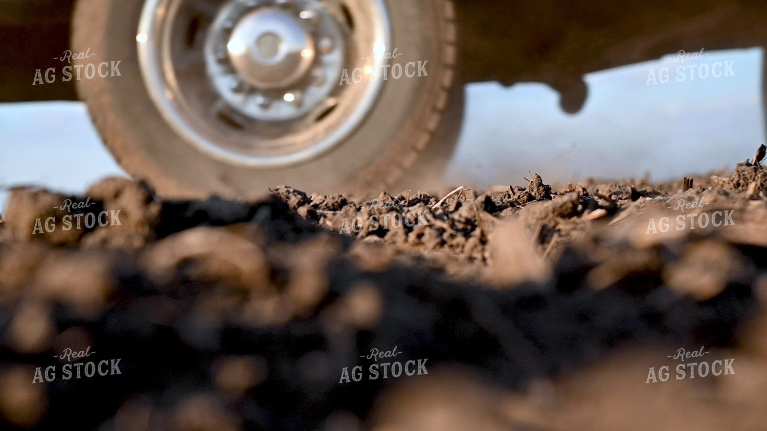 Truck Wheel Rolling Over Soil 25227