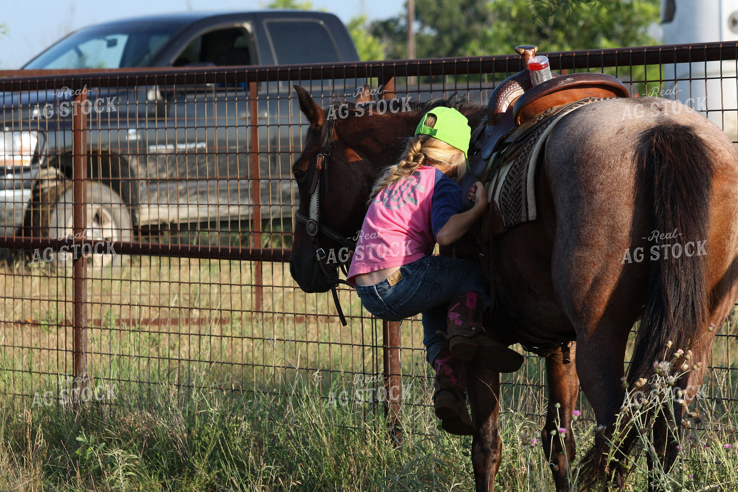 Ranch Kid Climbing on Horse 205014