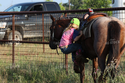 Ranch Kid Climbing on Horse 205014