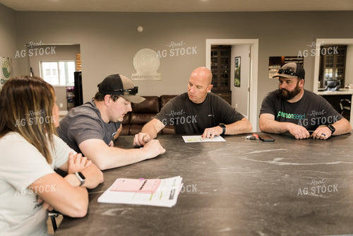 Farmers Review Seed Orders in Farm Office 7620