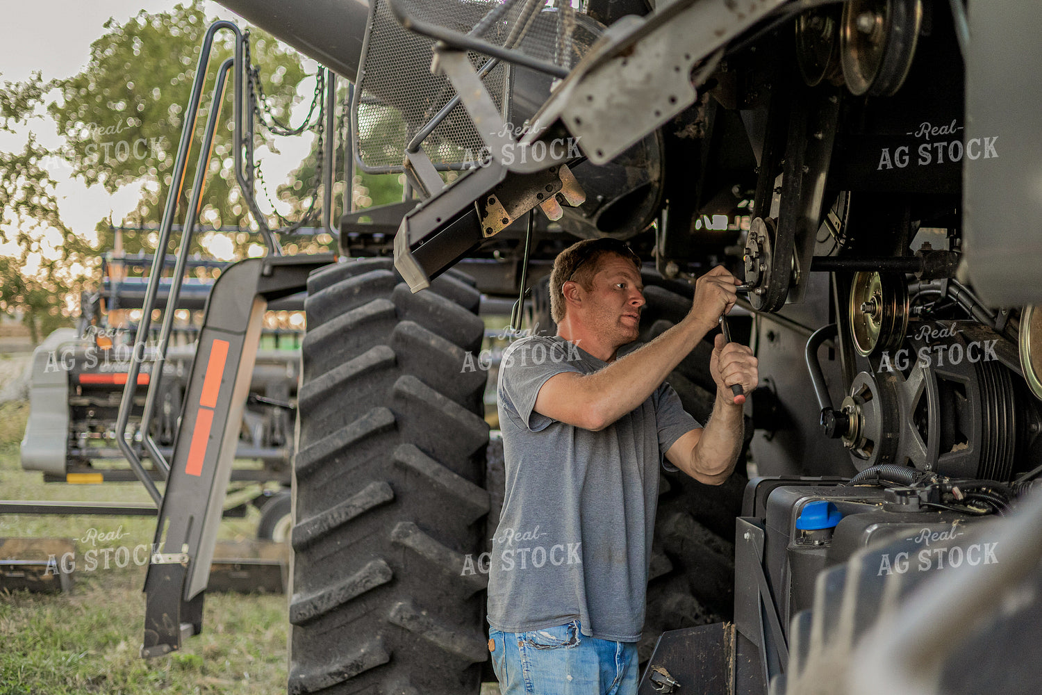 Farmer Working on Combine 93346