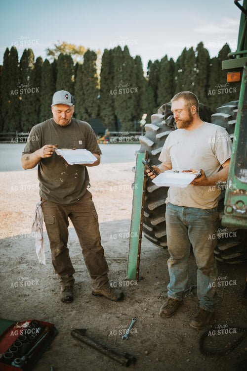 Farmers Eating Field Meals While Working on Combine 5059