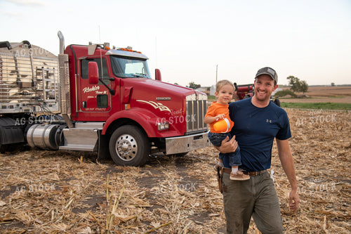 Father and Son Playing in the Field 25829