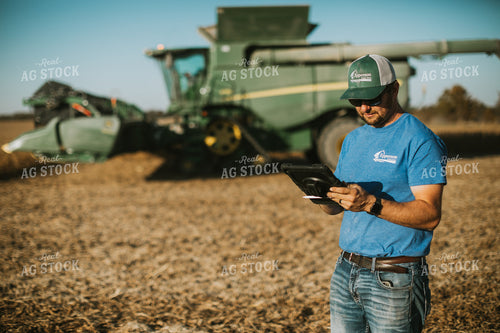 Farmer in Field With Tablet 7152