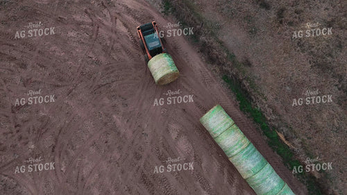 Aerial of Moving Round Bales 239494