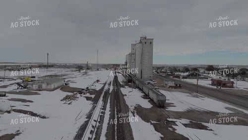 Grain Terminal Alongside Train Tracks 239135