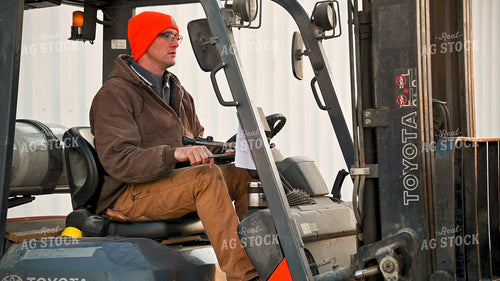 Loading the Seed Tender with the Skidsteer 25320