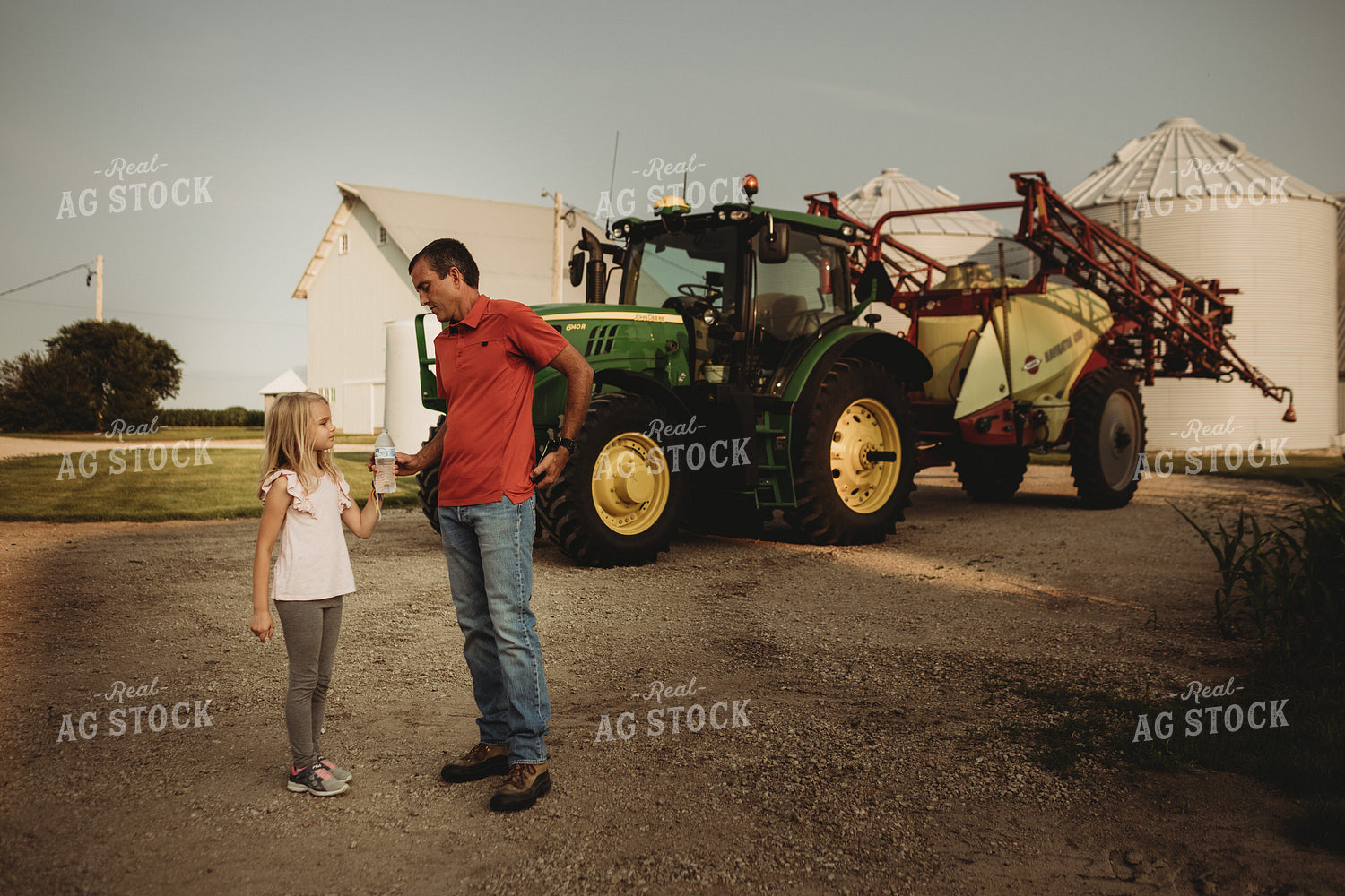 Farmer Talking to Daughter at Sunset 4536