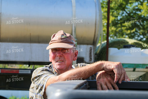 Farmer Leaning on Truck 160322