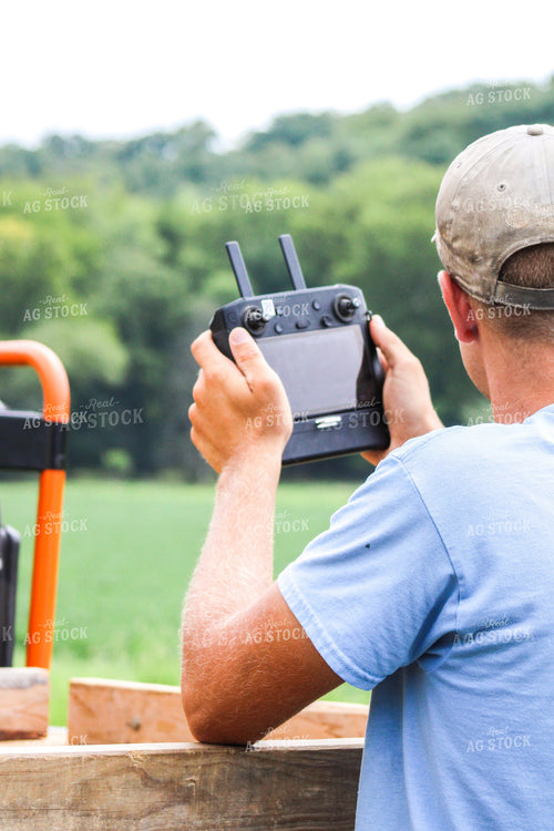 Farmer Holding Drone Remote 101022