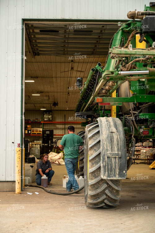Farmers Filling Self-Propelled Sprayer 115751