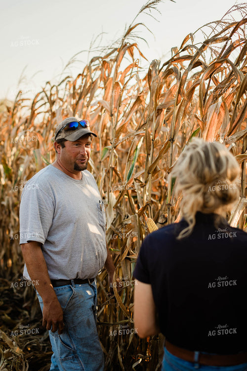 Farmer and Agronomist Talking in Field 8287