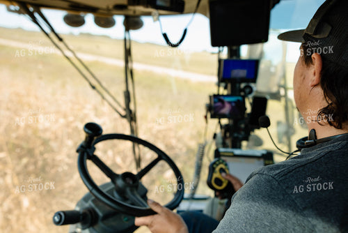Farmer in Combine Cab 152288