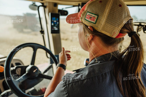 Female Farmer Driving Tractor 115220