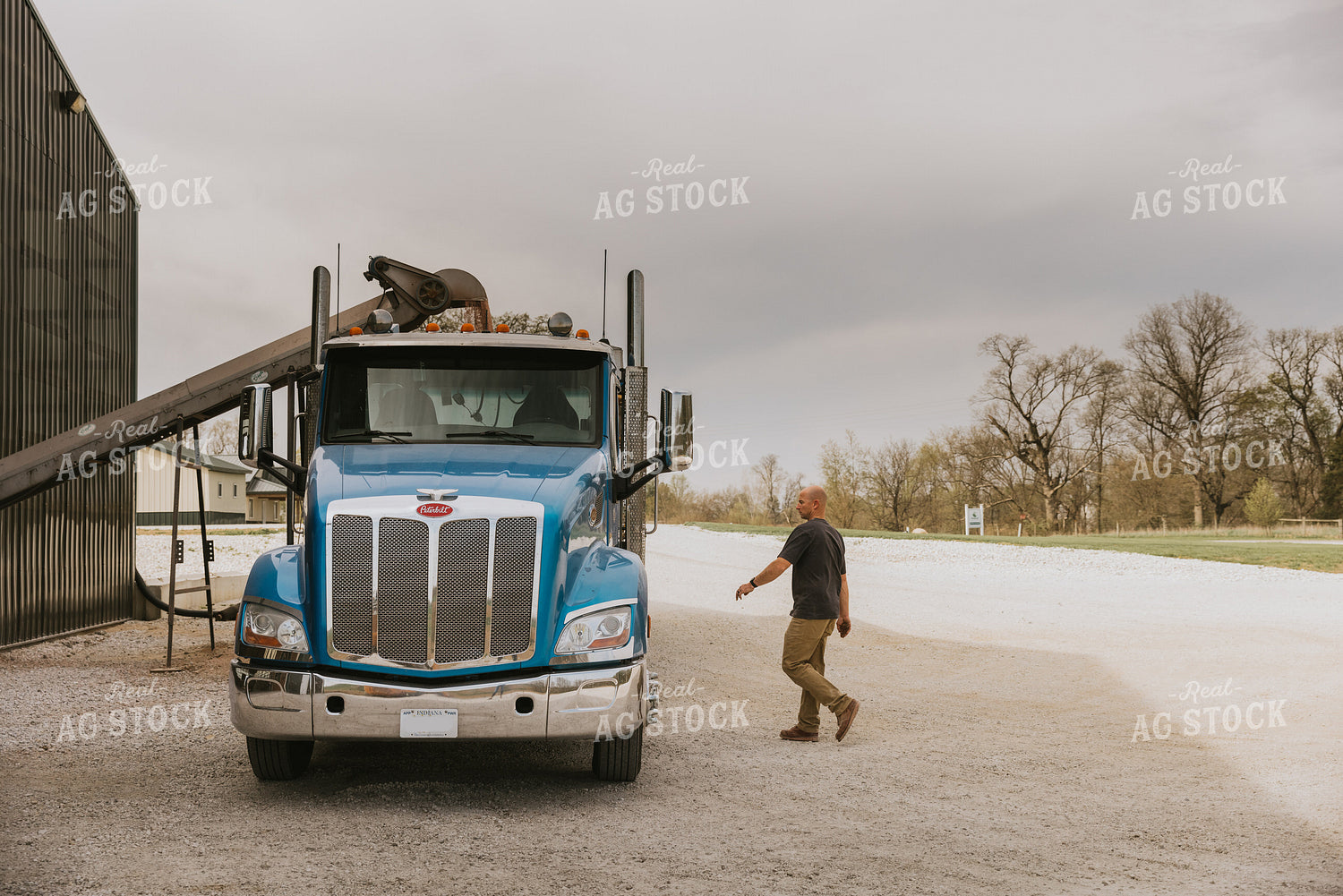 Farmer Approaches Truck 7544
