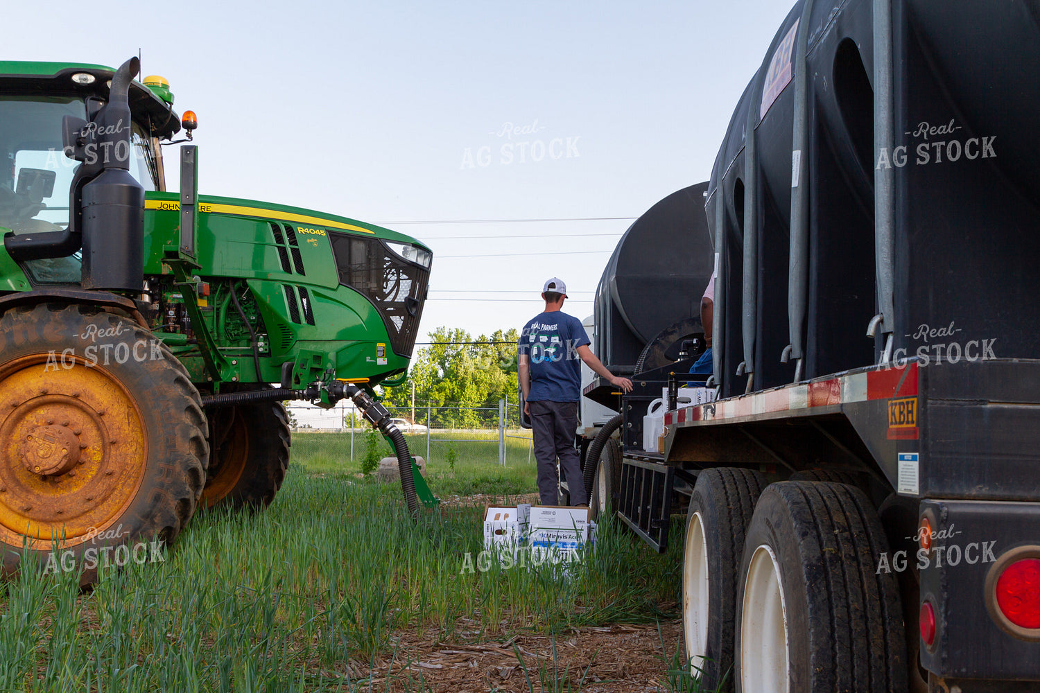Male Farmer Filling Up Sprayer 79000