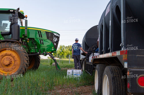 Male Farmer Filling Up Sprayer 79000