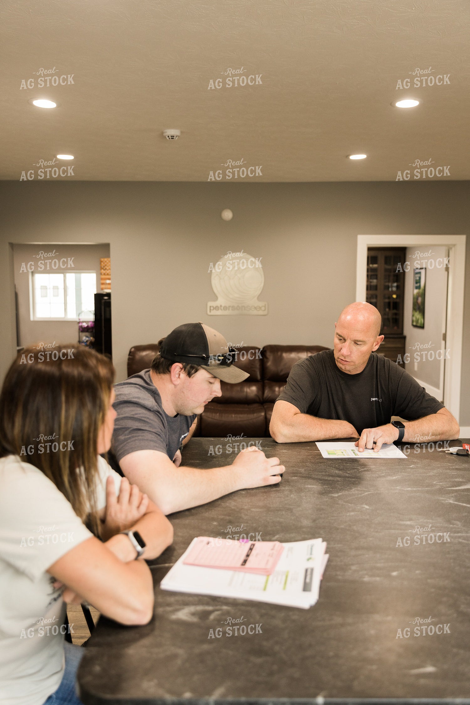 Farmers Review Seed Orders in Farm Office 7619