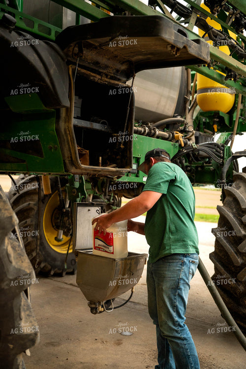 Farmer Filling Self-Propelled Sprayer 115741