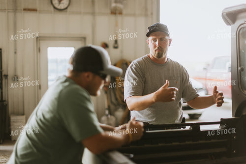 Farmers Talking in Shed 7743