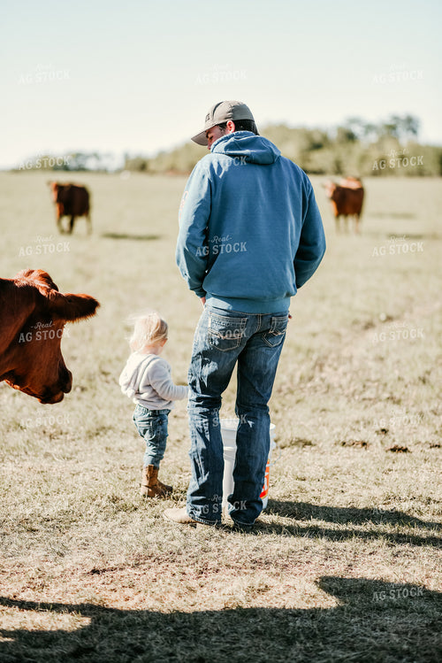 Rancher and Farm Kid in Cow Pasture 64168