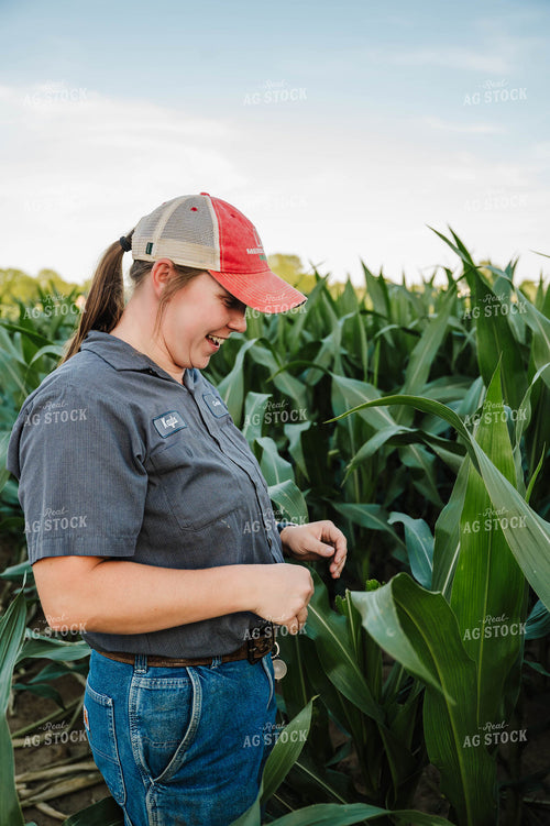 Female Farmer Checking Corn 115288
