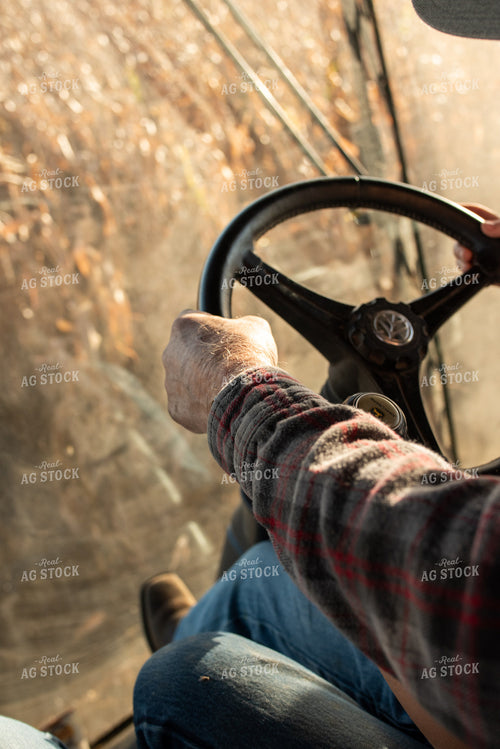 Farmer Driving Combine 76532