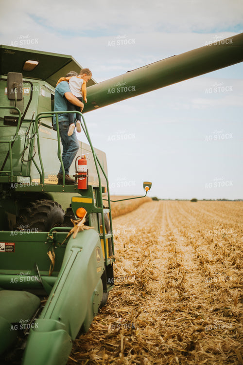Farm Kid and Farmer Getting Out of Combine 6606